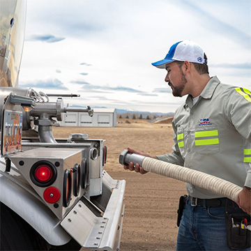 Man unloading milk image