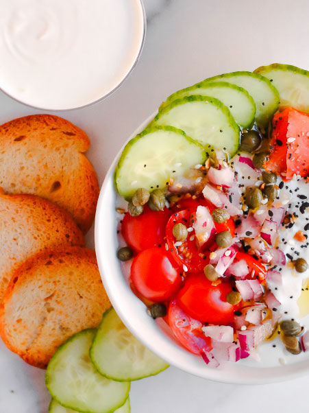 Refuel with a smart afternoon snack, like a cottage cheese bowl filled with veggies and spices. 